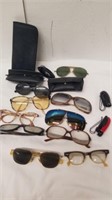Group of vintage sunglasses and glasses with