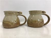 Two Red Duck pottery mugs