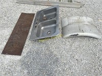 Aluminum fenders, stainless sink, and metal