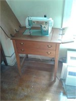 New home cabinet sewing machine