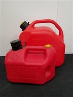 Two plastic gas containers one is one gallon and