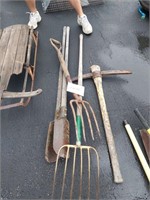 Hand tools - potato forks, pick ax, and post