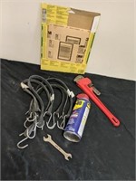 Group of sandpaper, tarp straps, wrench, & WD-40