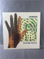 A Genesis "Invisible Touch" Vinyl Record.  No