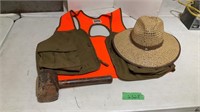 Straw hat, hunting vest, wooden mallet