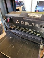 Delta 12" planer comes with stand - working