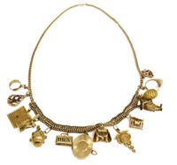 14KT GOLD CHARM NECKLACE W/ FOURTEEN CHARMS
