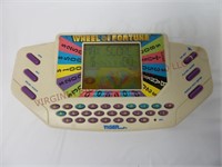 Tiger Wheel of Fortune Handheld Game ~ Powers On