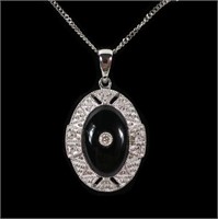 14K White gold onyx pendant with diamond accent on