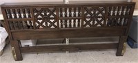 Wooden carved headboard measuring 78.5 across and