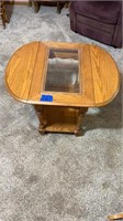 Glass topped side table with leaves
26”w x 32” L