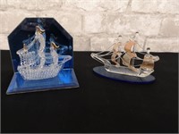 Two glass ship models for your home decor.