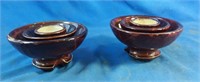 2 Large insulators used as candle holders