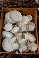 ASSORTMENT OF TEA CUPS AND SAUCERS