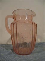 pink depression glass water pitcher .