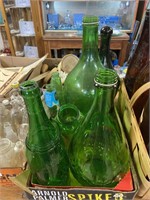 assorted green glass bottles