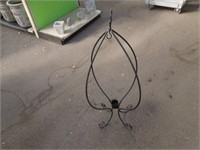 Wrought iron plant hanger and globe stand