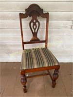 Antique upholstered wooden chair