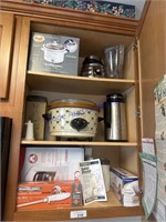 CONTENTS OF TOP CUPBOARD--CROCK POTS, BLENDER,