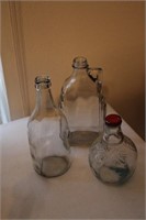 Lot of three vintage glass bottles