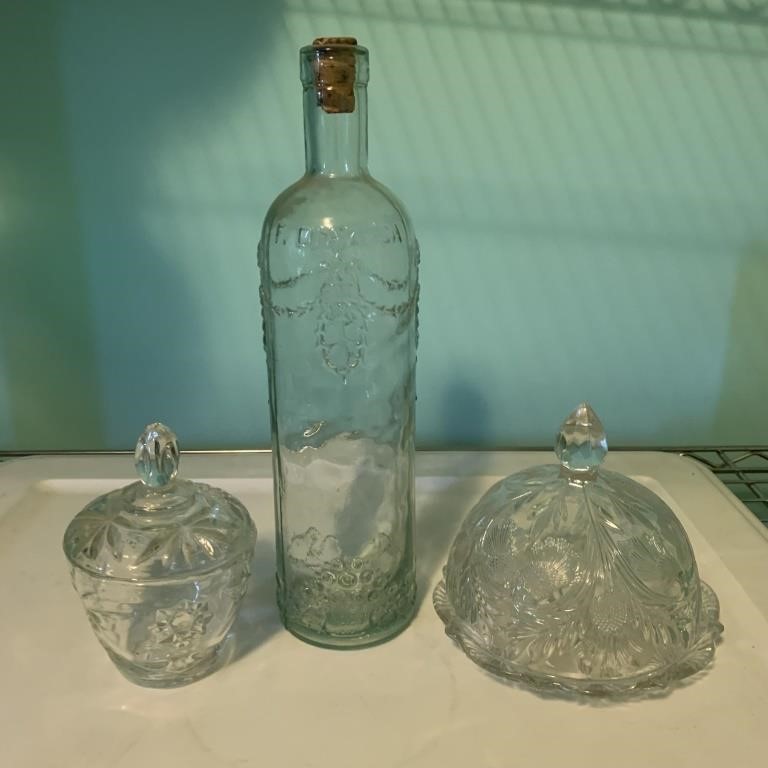 CLEAR GLASS EMBOSSED GLASS BOTTLE, ROUND GLASS