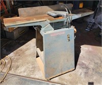 F7) 6 inch jointer and stand on wheels.
