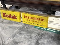 Kodak advertising sign missing one panel