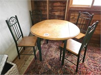 Drop leaf table w/ 4 chairs. Table is 50" x 24" &