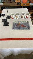 Candle holders, matching mugs and cutting board.