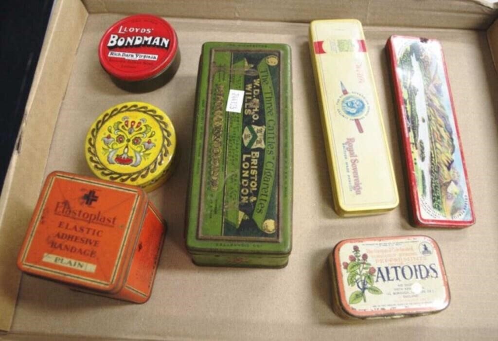 Group early advertising lidded tins