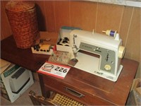 Singer Sewing Machine in Cabinet, Bobbins,