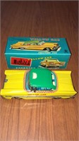 Cragstan yellow cab tin friction toy mint in box.
