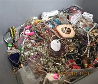 LARGE TOTE OF MISMATCHED  BROKEN JEWELRY FOR