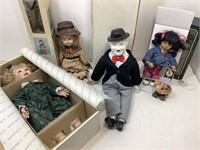 4 collector dolls. Assorted