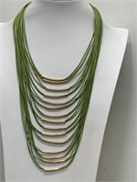 MULTI TIERED GOLDEN ACCENT NECKLACE