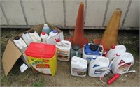 Assortment of garden liquids includes Roundup,