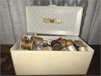 4 containers with sewing supplies