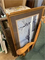 three framed pictures including barn in winter