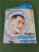 Lighted fogless shower mirror