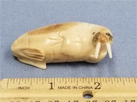 2.25" fossilized ivory carving of a walrus    (k 1