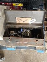 old metal tool box with some tools