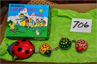 Tin toy mechanical lady - Bug Family Parade
