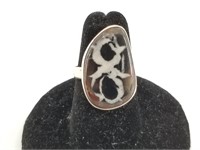 Sterling silver ring with unique stone set in face