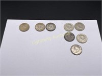 EIGHT U.S. SILVER HALF DOLLARS