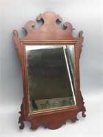 Small antique mirror in wood frame