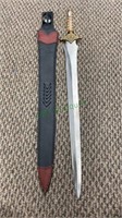 32 inch sword with leather scabbard,  with a