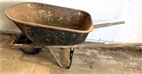 wheel barrow- see small holes in tub