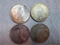 4 Peace silver dollars