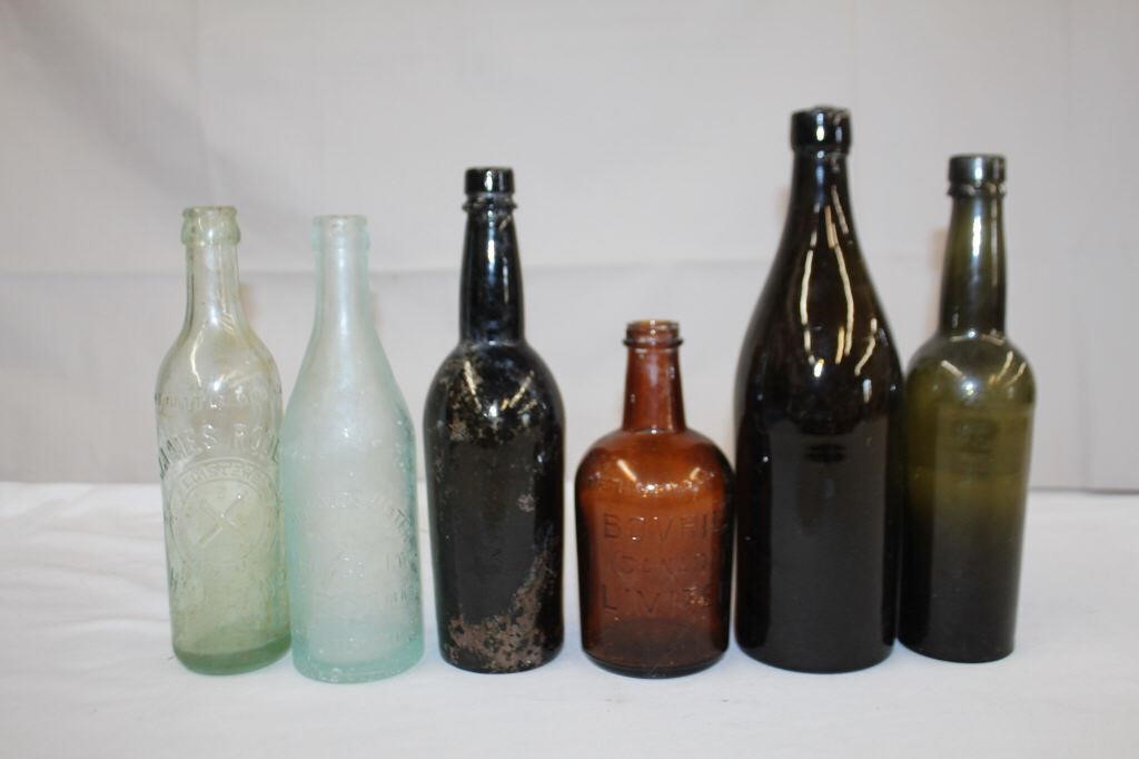 Six vintage bottles, James Roue - Nova Scotia,