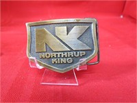 Northrup King farming belt buckle.